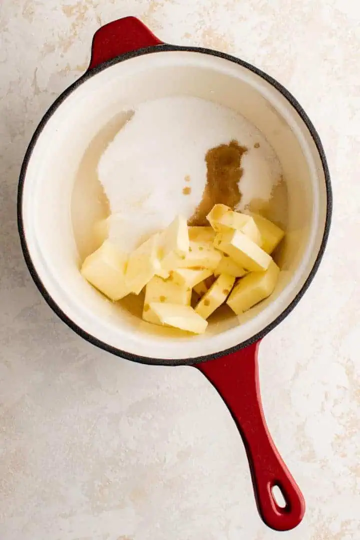 Butter and sugar in a saucepan.