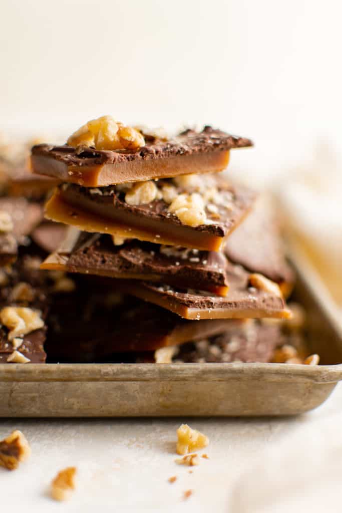 Stack of toffee on a baking sheet.