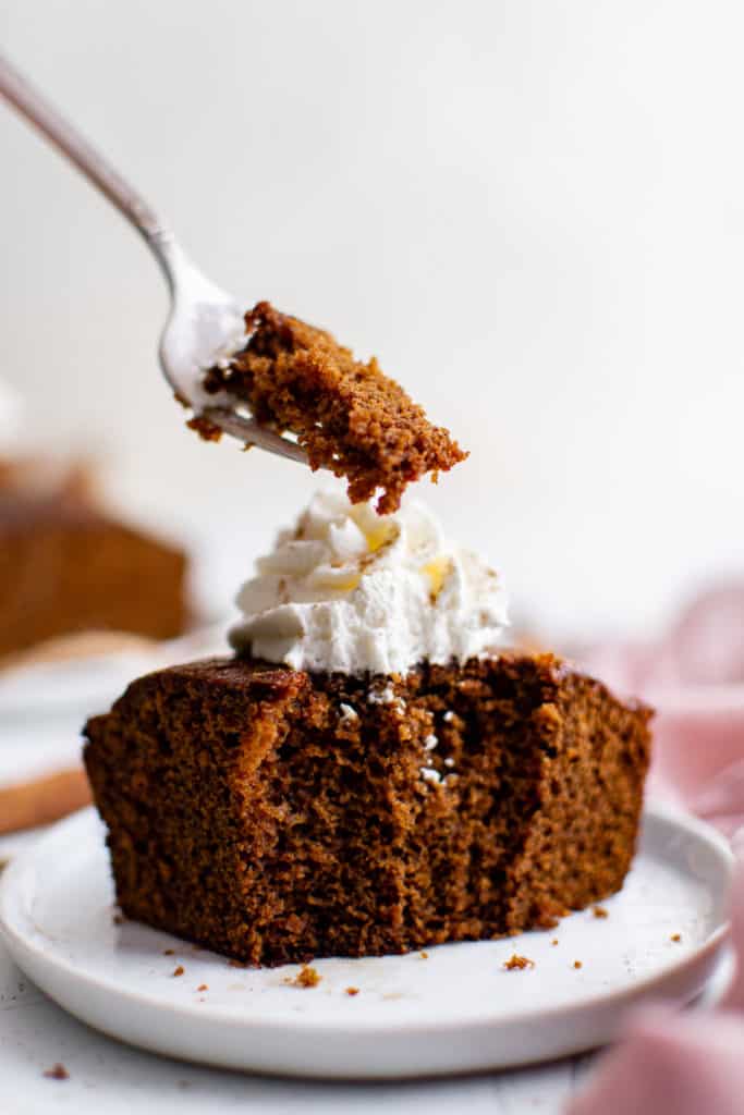 Gingerbread cake on a fork.
