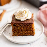 Slice of gingerbread cake on a plate.