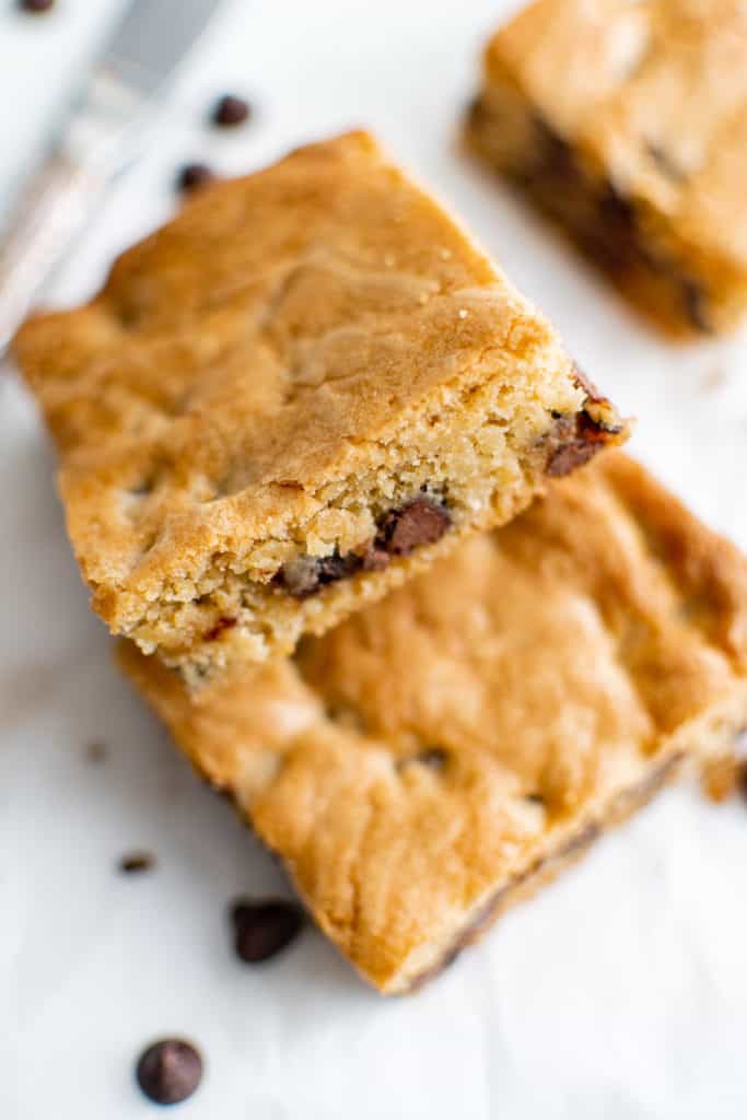 Two cookie bars leaning against each other.