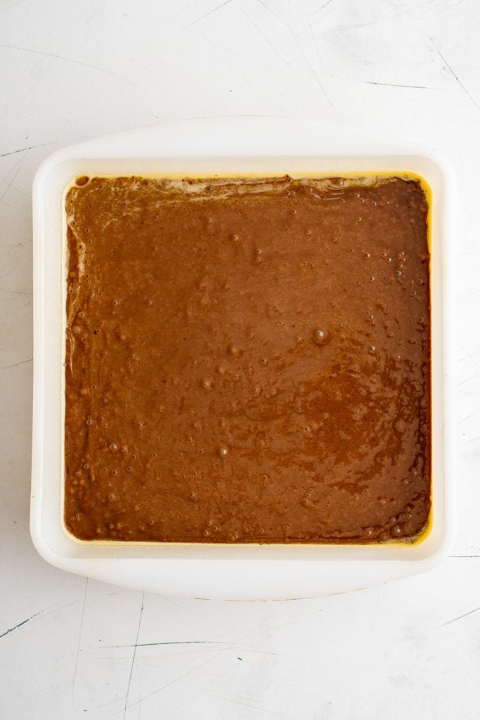 Chocolate cake batter in a pan.