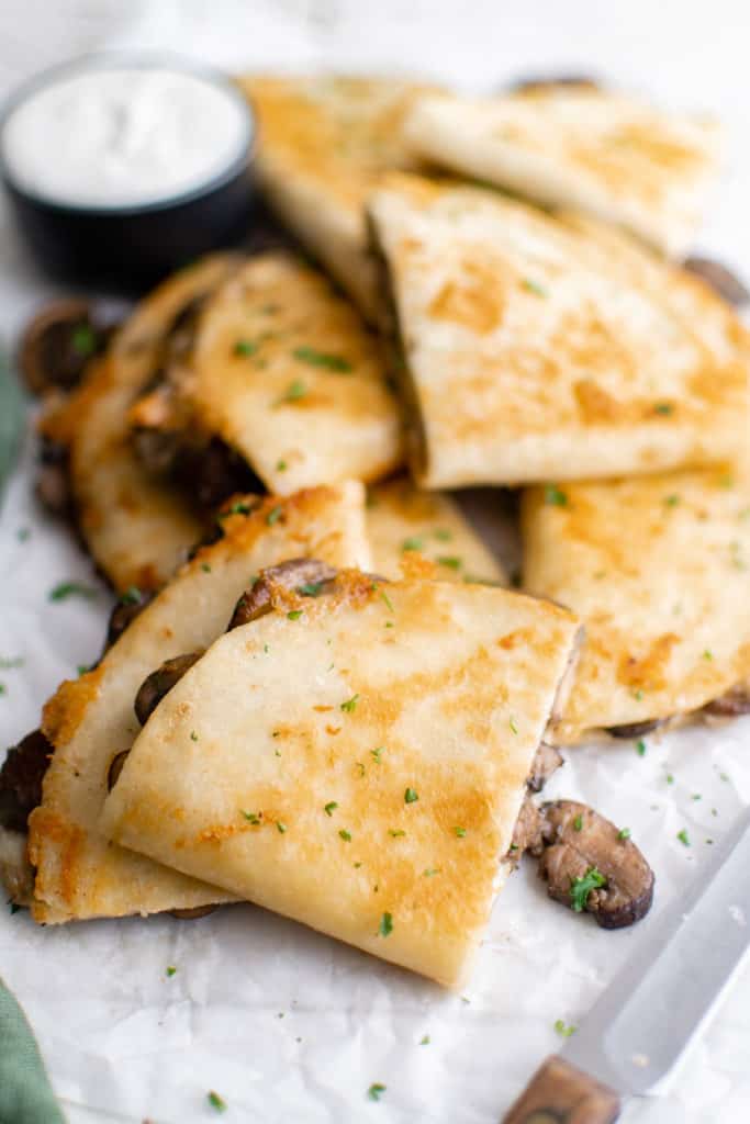 Top down view of a pile of quesadillas.