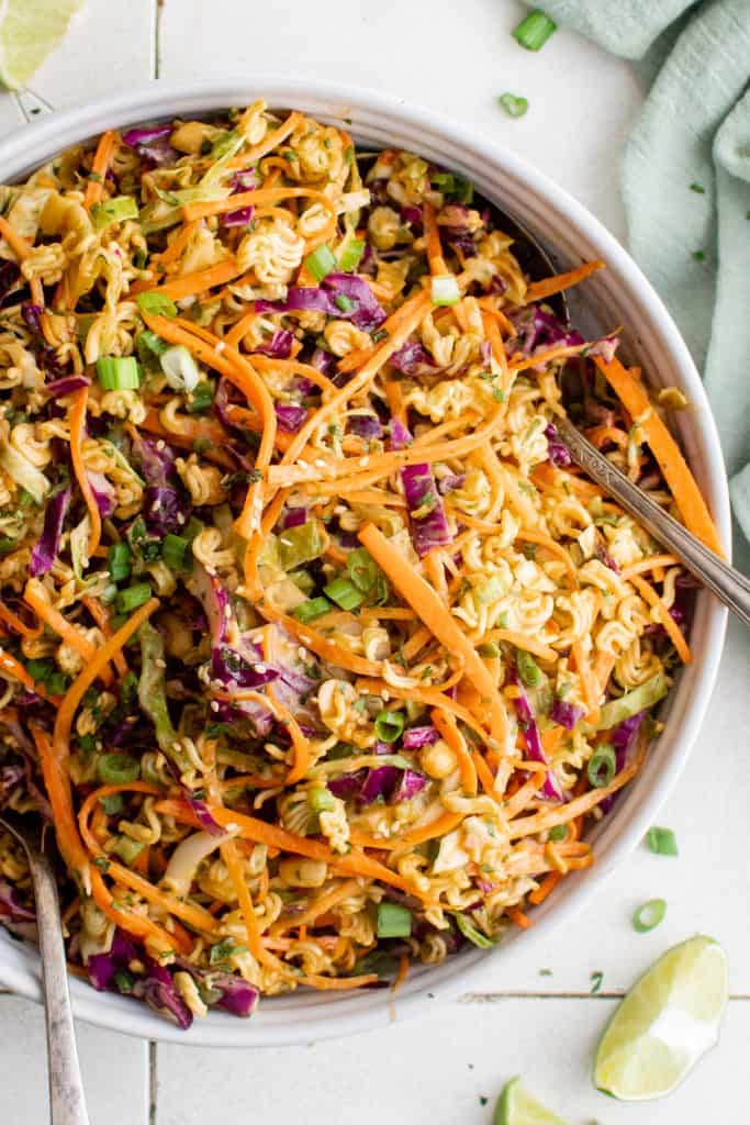 Top down view of ramen noodle salad in a serving dish.