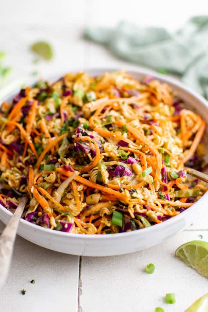 Large dish filled with ramen noodle salad.