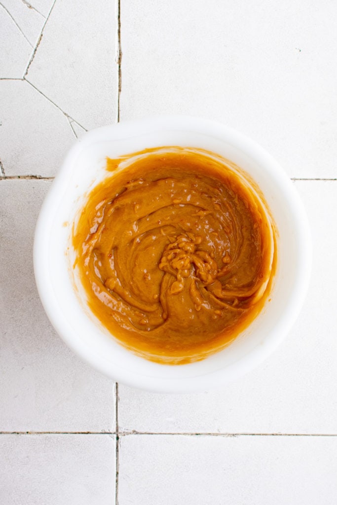 Soy sauce salad dressing in a bowl.