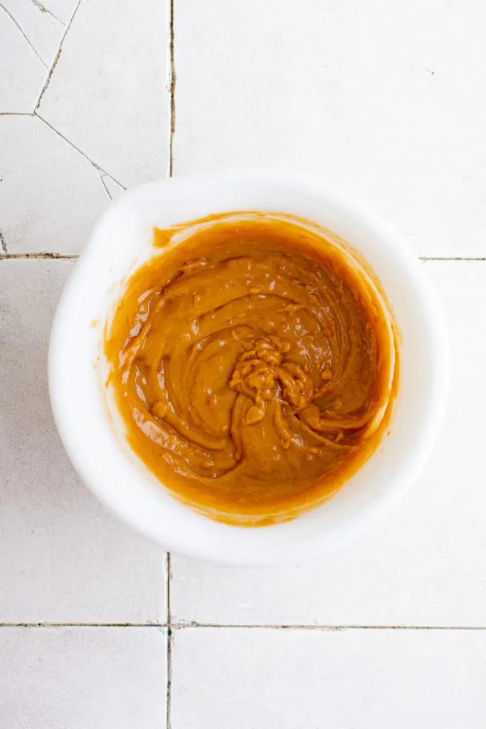 Soy sauce salad dressing in a bowl.