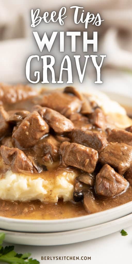 Close up of a plate of beef tips and gravy.