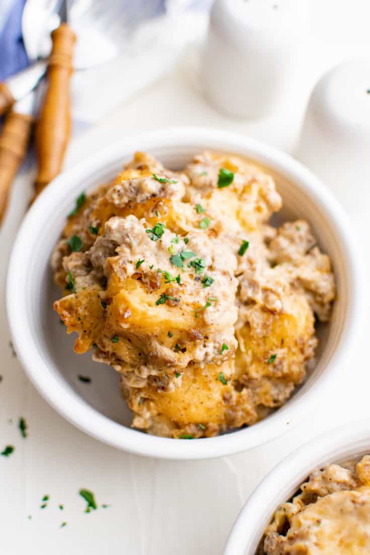 Close up view of biscuit and gravy casserole in a bowl