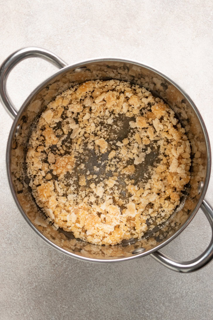 Sugar forming balls in a pan.