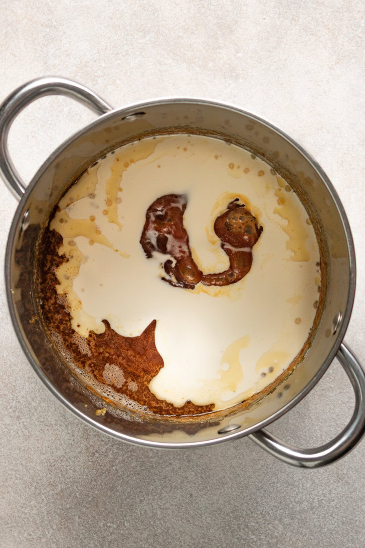 Top down view of a melted sugar and heavy cream.