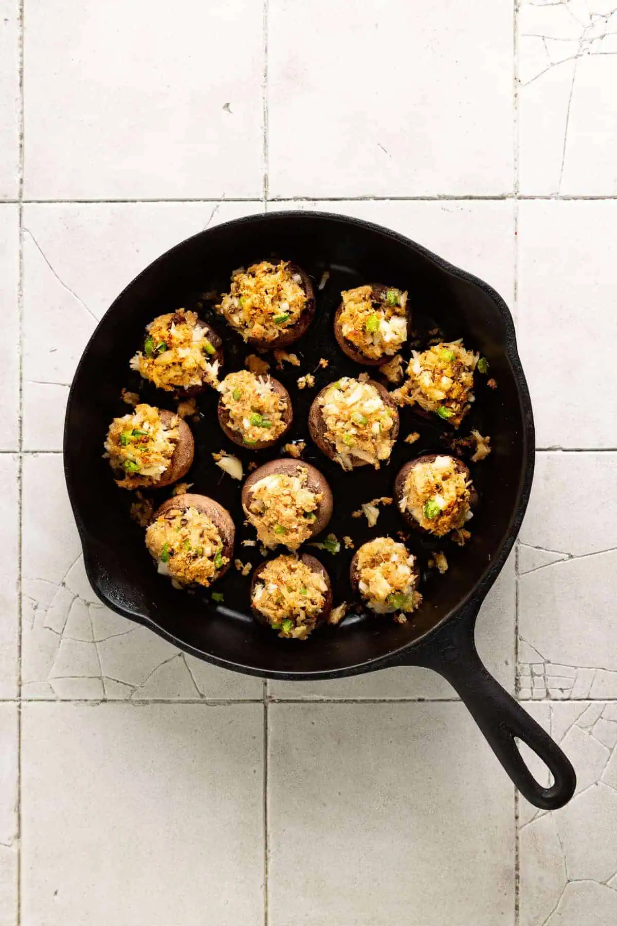 Baked stuffed mushrooms in cast iron.