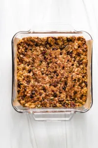 Granola bars in a glass dish.