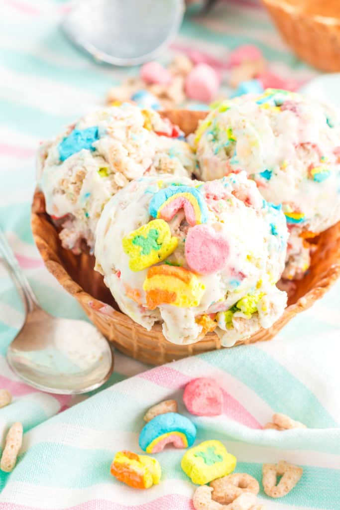 Scoops of lucky charms ice cream in a bowl.