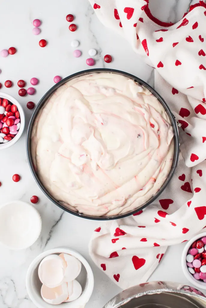 Cheesecake batter in a springform pan.