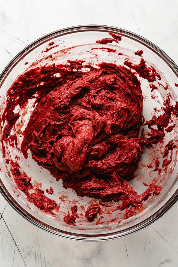Red velvet cake mix in a bowl.