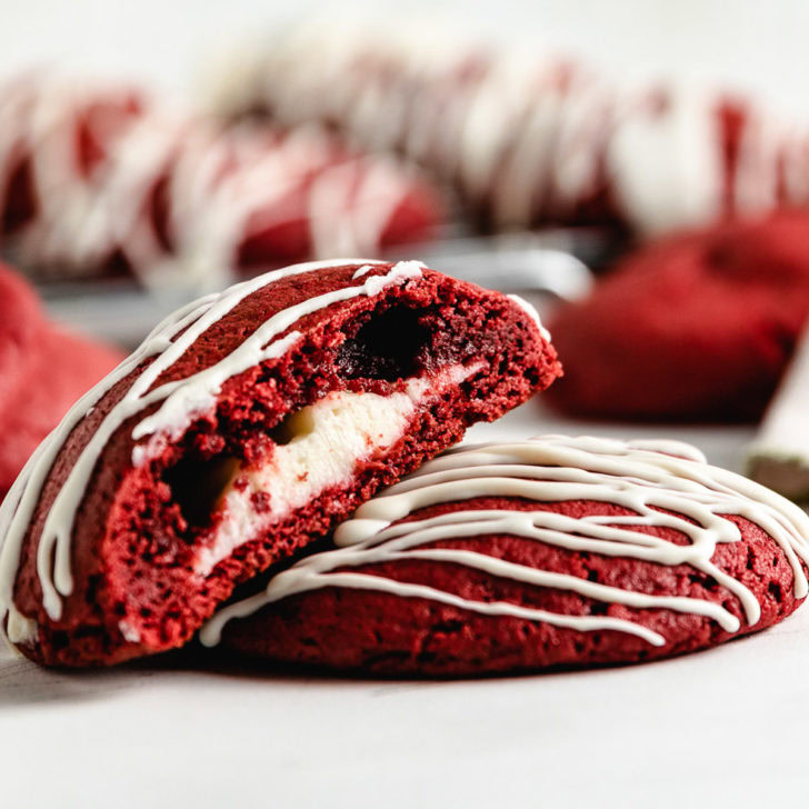 Red velvet cake mix cookie cut in half.