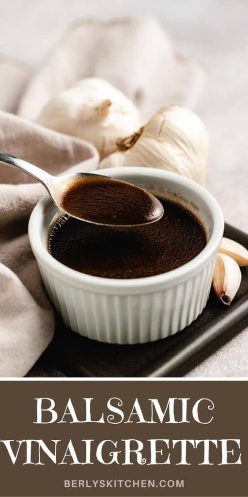 Close up view of balsamic vinaigrette in a white ramekin.