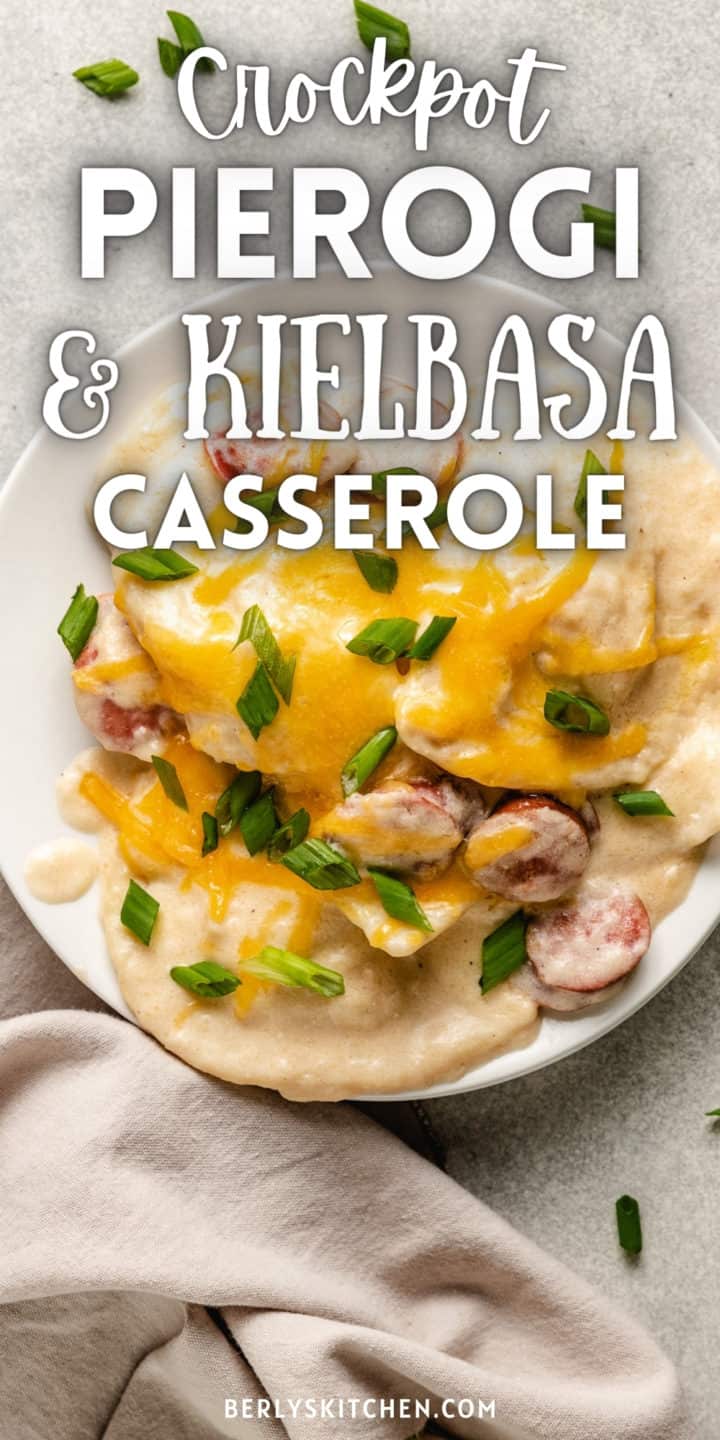 Scoops of crockpot pierogi and kielbasa casserole on a plate.