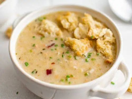 Croutons on to of potato leek soup.