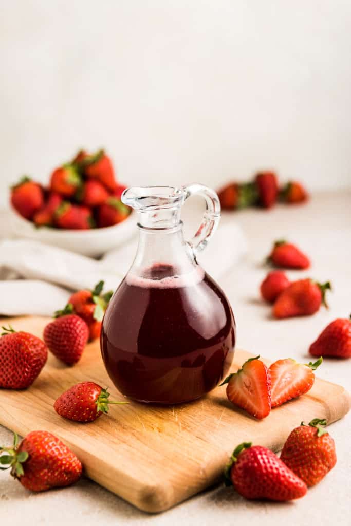 Bottle of strawberry syrup.