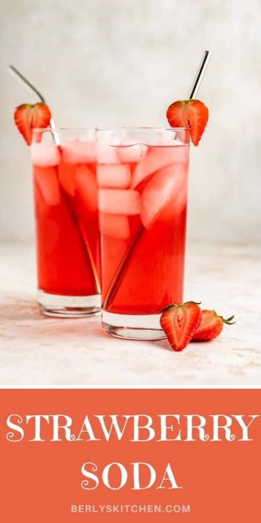 Two glasses filled with strawberry simple syrup.