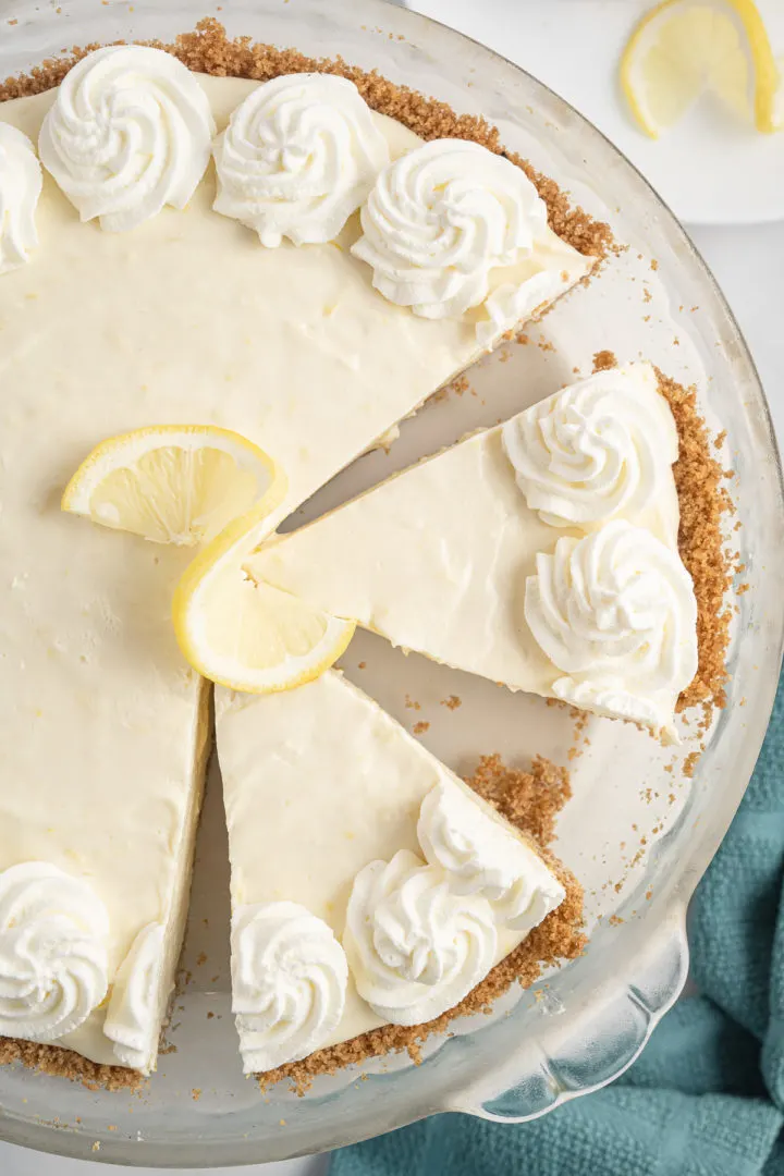 Lemon Icebox Pie Top down view of sliced lemon icebox pie.