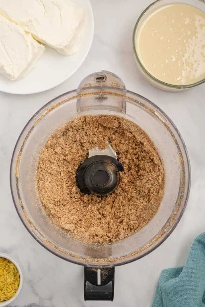 Graham cracker crumbs in a food processor.