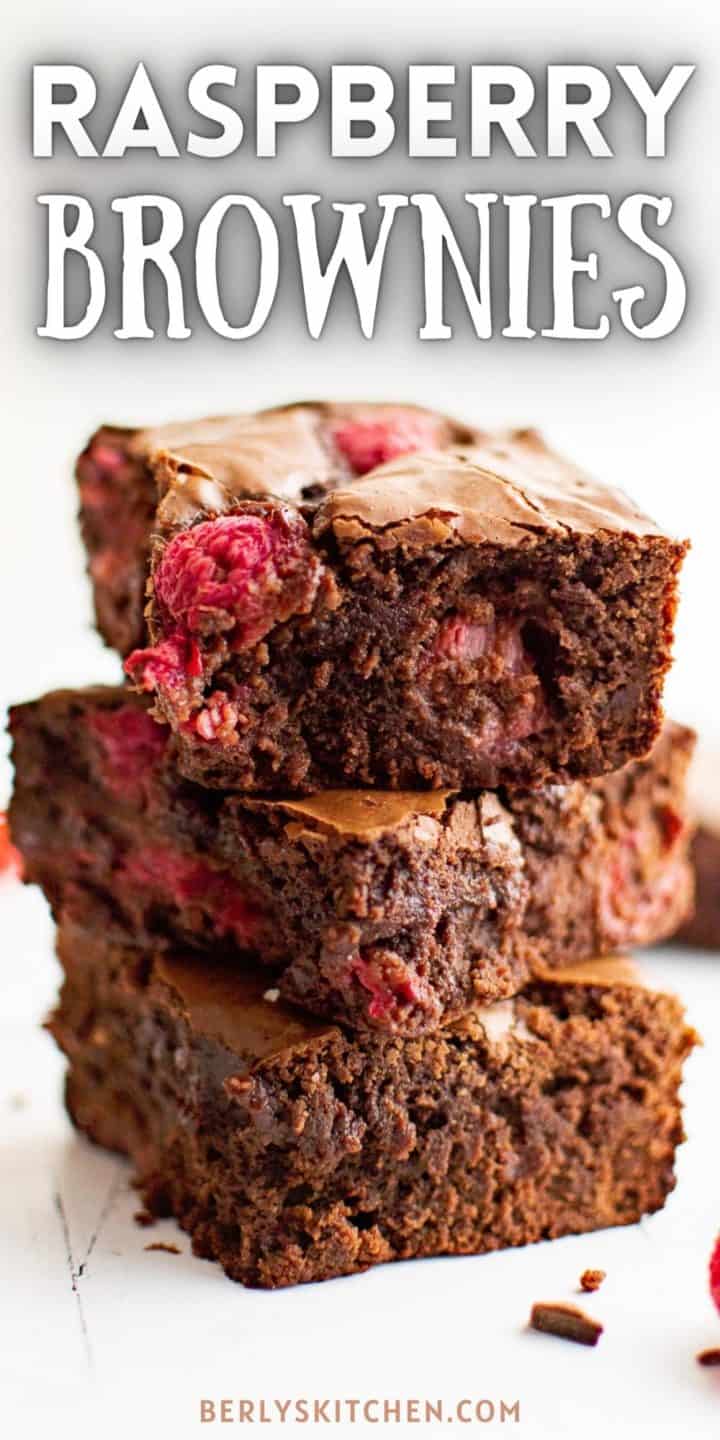 Close up view of a stack of raspberry brownies.