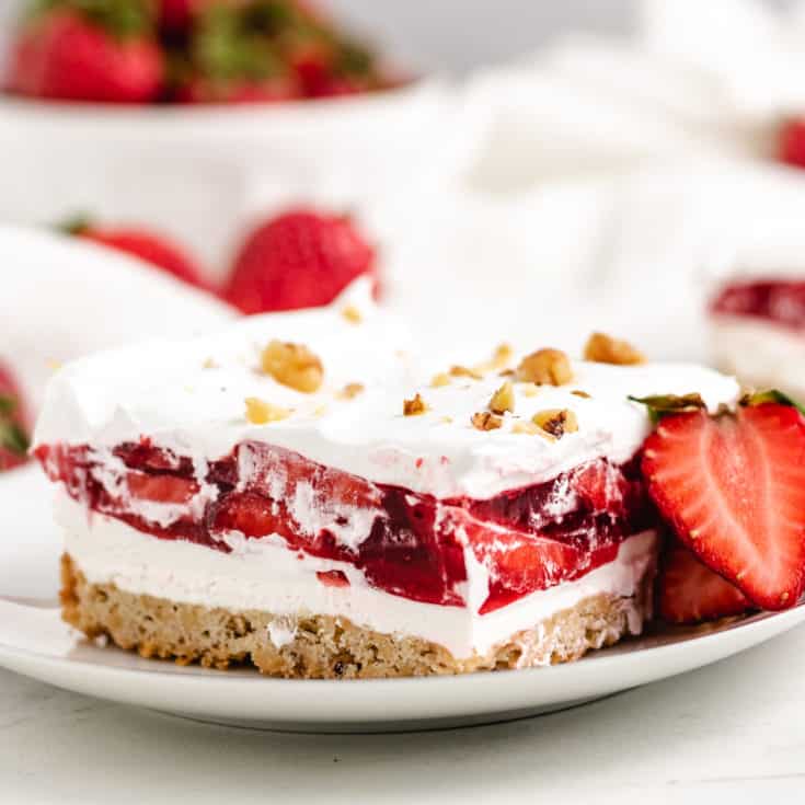 Slice of strawberry dessert on a plate.