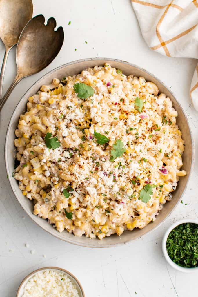 Top down view of mexican street corn pasta salad in a bowl.