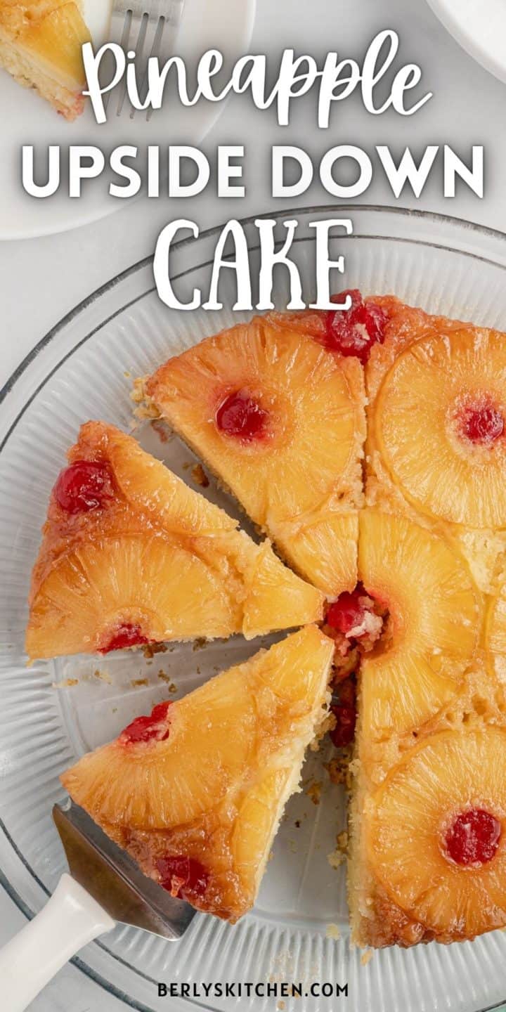 Top down view of pineapple upside down cake on a glass platter.