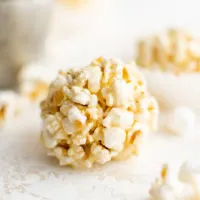Popcorn ball on parchment.