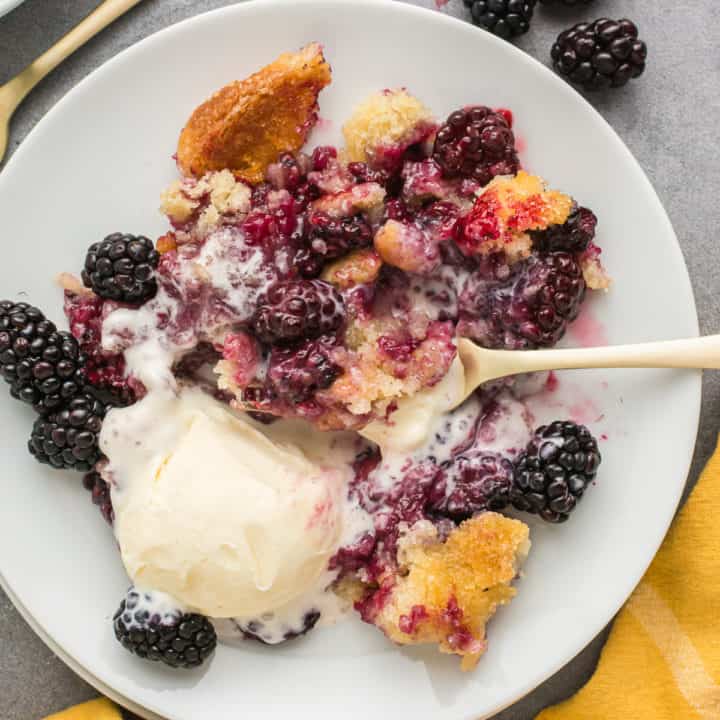 Cobbler and ice cream on a plate.