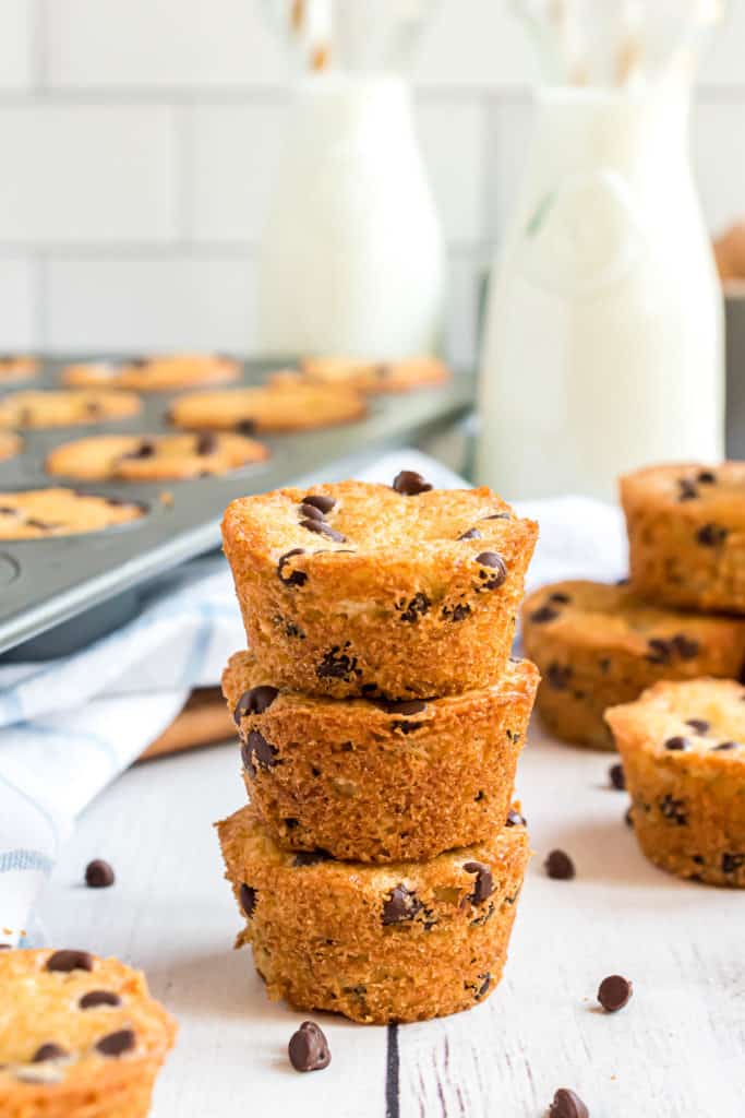 Three chocolate chip muffins made with pancake mix in a stack.