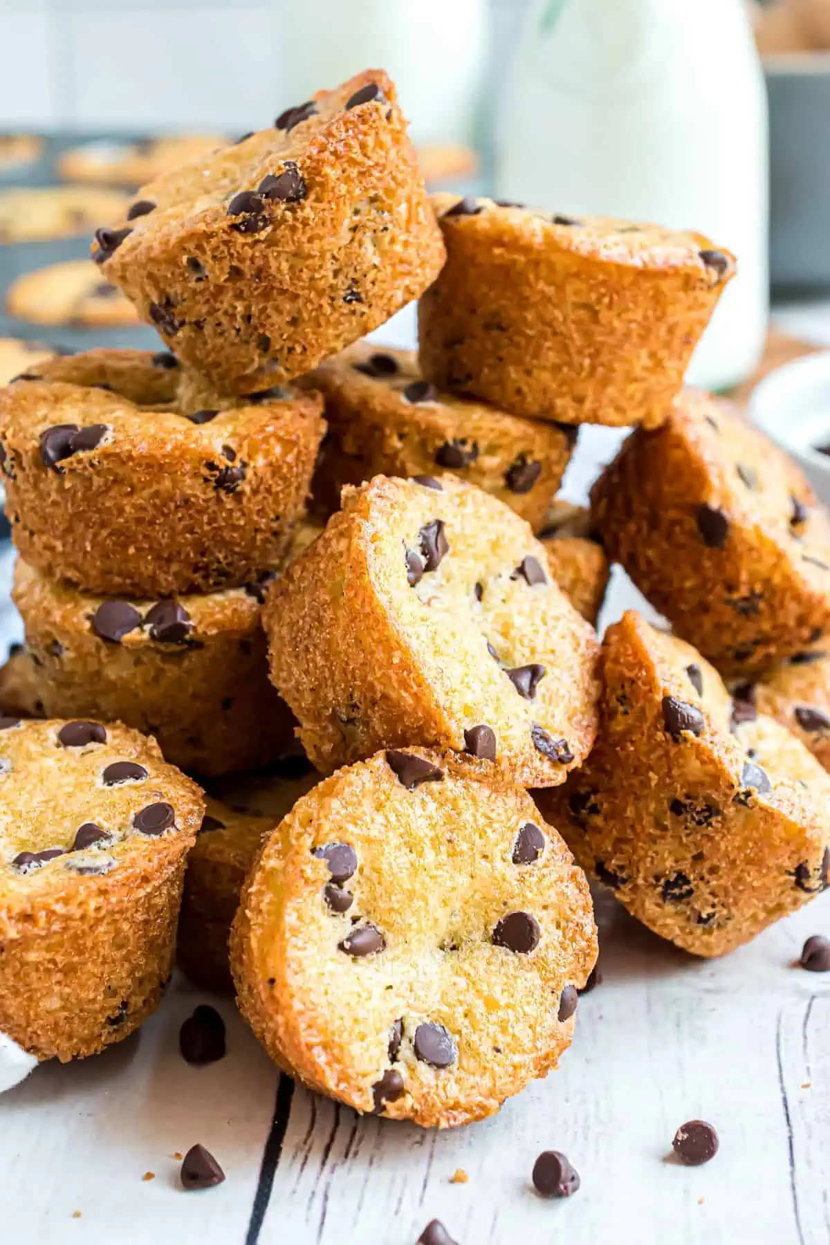 Batch of mini chocolate chip muffins in a pile.