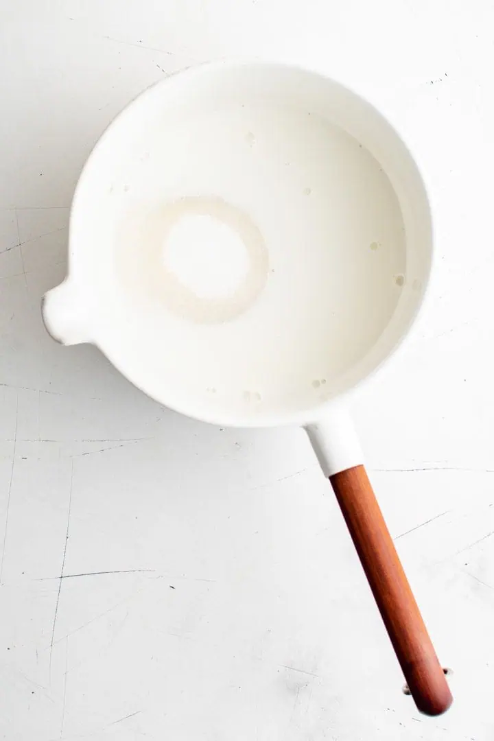 Milk, sugar and salt in a saucepan.