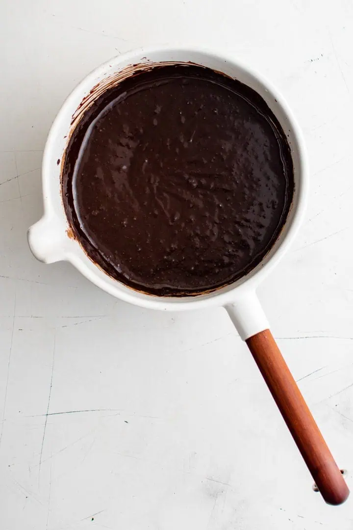 Cocoa powder mixed with milk.