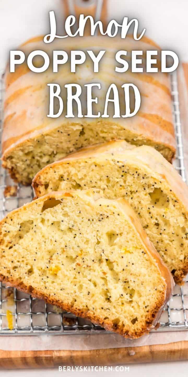 Sliced lemon poppy seed bread on a board.