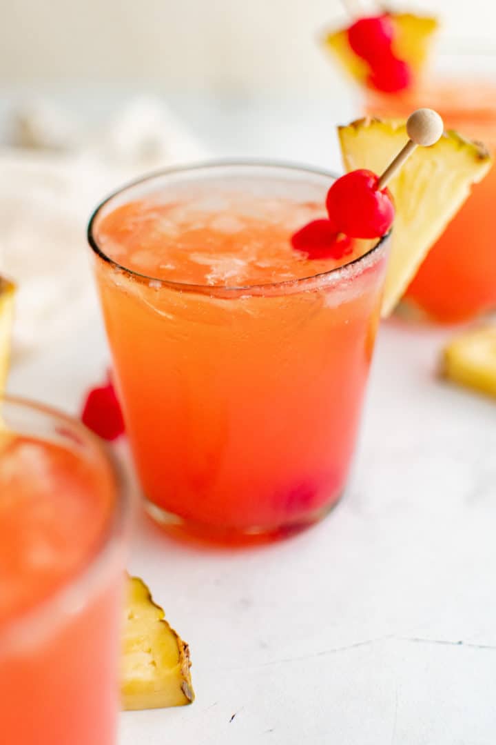 Mai tai with a cherry and pineapple wedge.