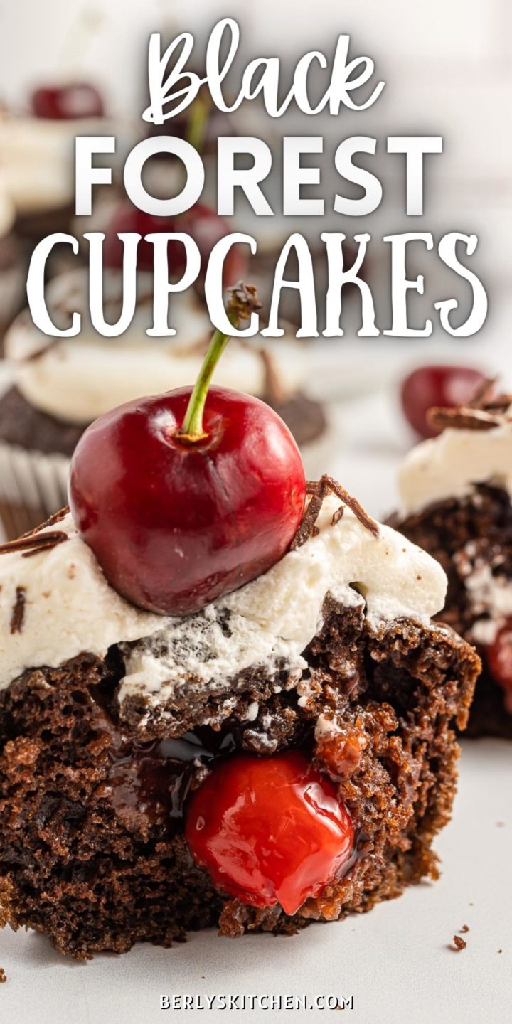 Cupcake with cherries and whipped cream.