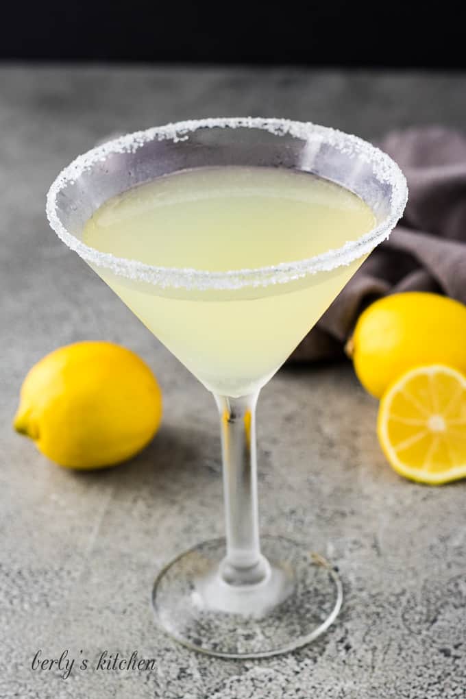 Lemon martini in a glass with a sugar rim.