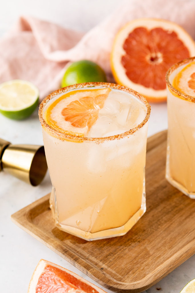 Angled view of a mezcalita with grapefruit.