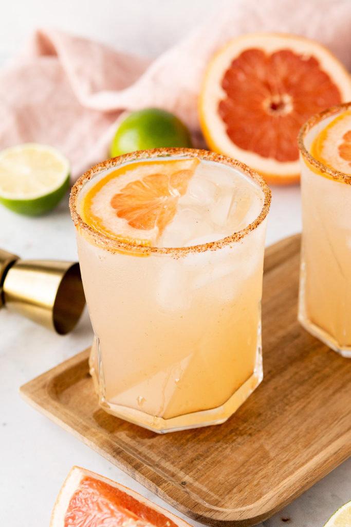 Angled view of a mezcalita with grapefruit.