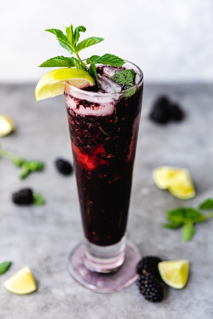 Mojito made with berries, mint and lime.