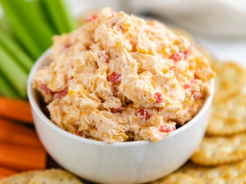 Pimento dip in a white bowl.