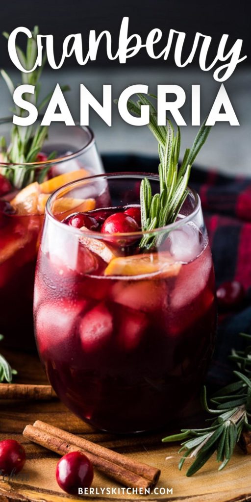 Two glass of sangria with rosemary.