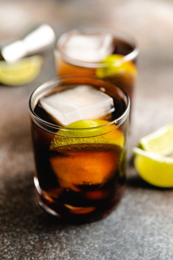 Angled view of rum cocktail in a glass.