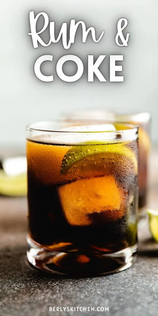 Close up view of rum and coke with lime.