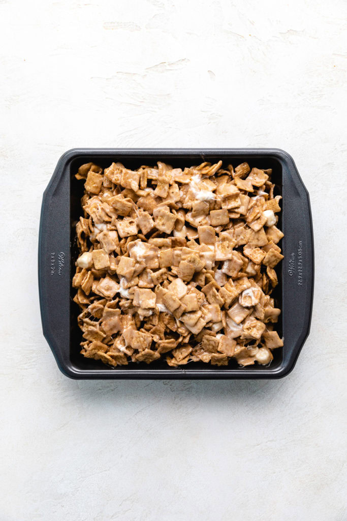 Baking pan filled with marshmallow cereal bars.